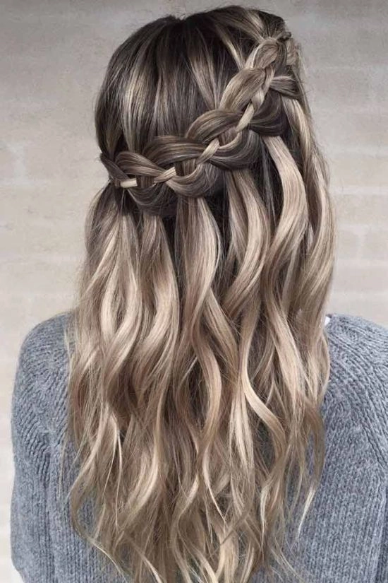 College student with a simple braided hairstyle in a casual setting