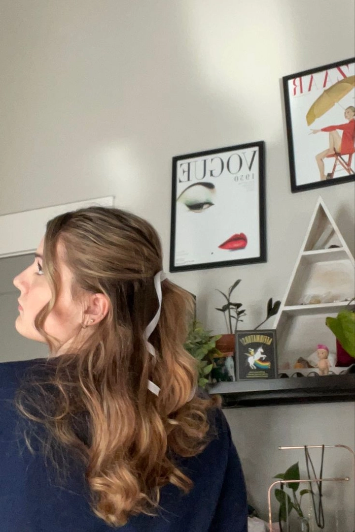 Coquette casual hairstyle featuring a quick ribbon ponytail