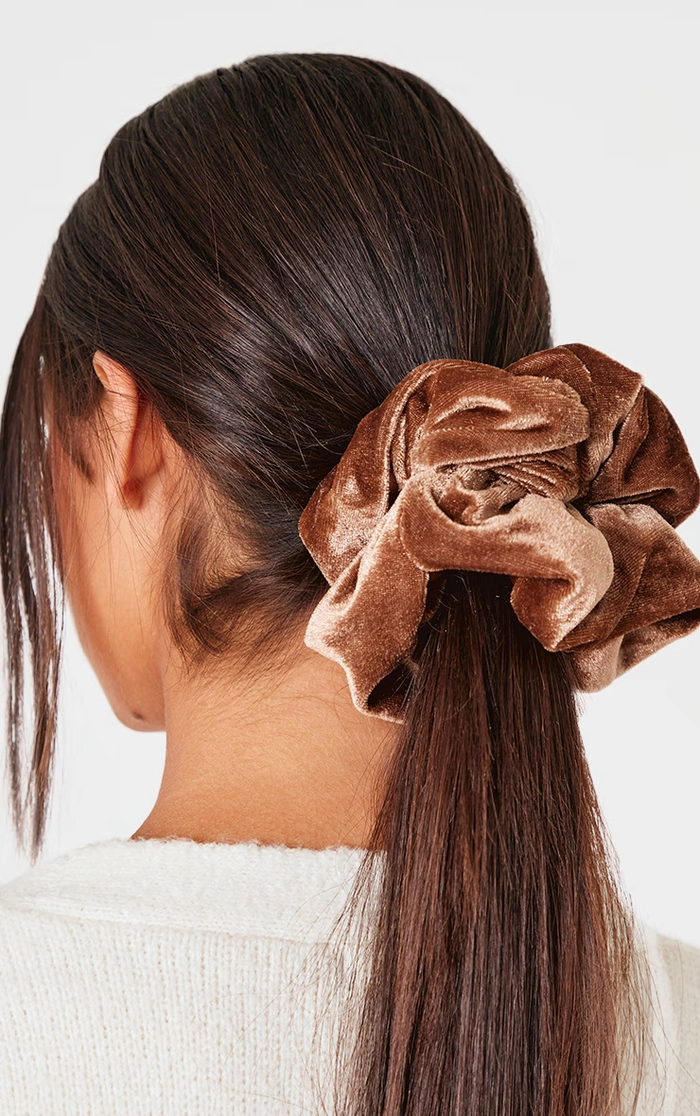Cozy winter casual updo with a simple velvet scrunchie