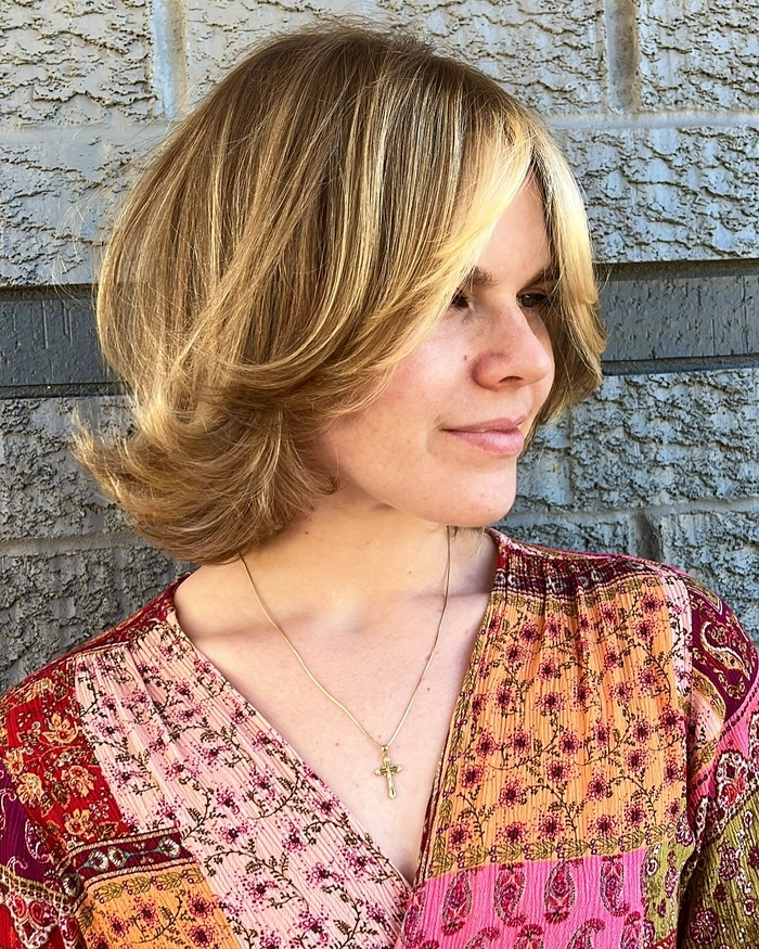 effortless flipped ends for medium retro casual hair image