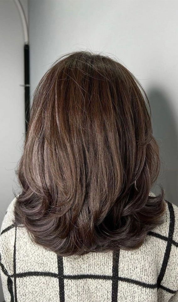 effortless flipped ends for medium retro casual hair image
