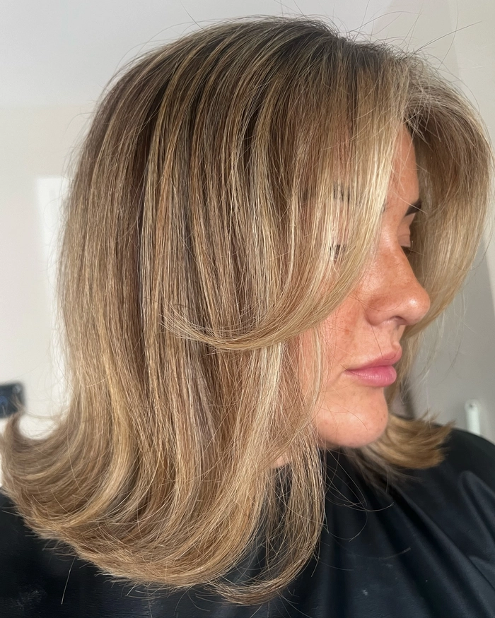 effortless flipped ends for medium retro casual hair image