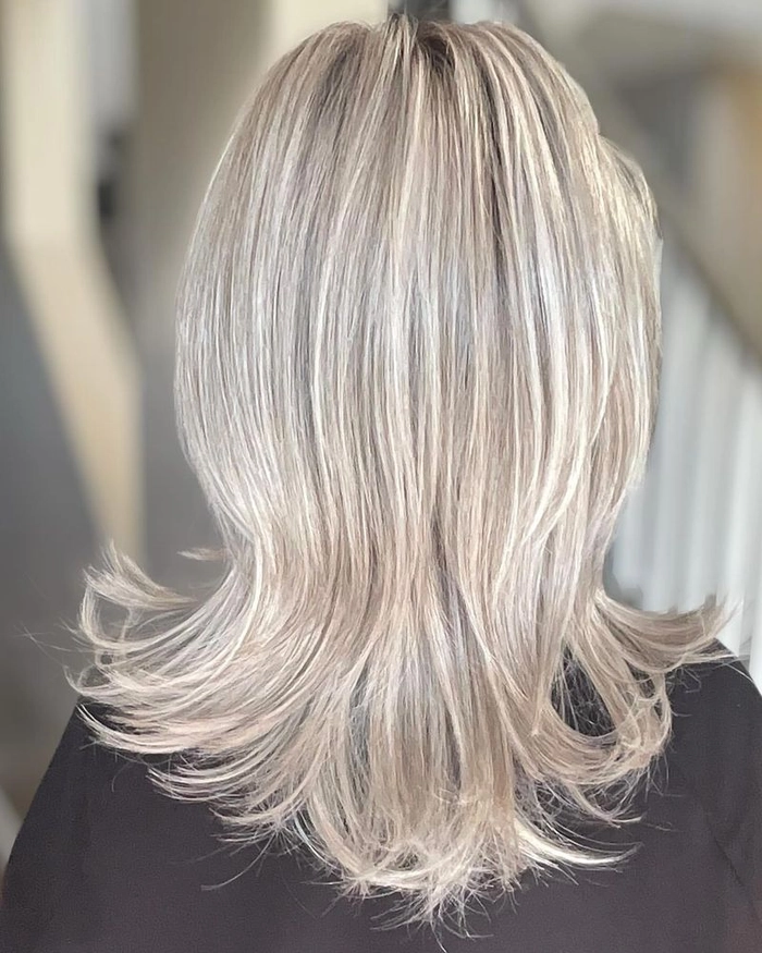 effortless flipped ends for medium retro casual hair image