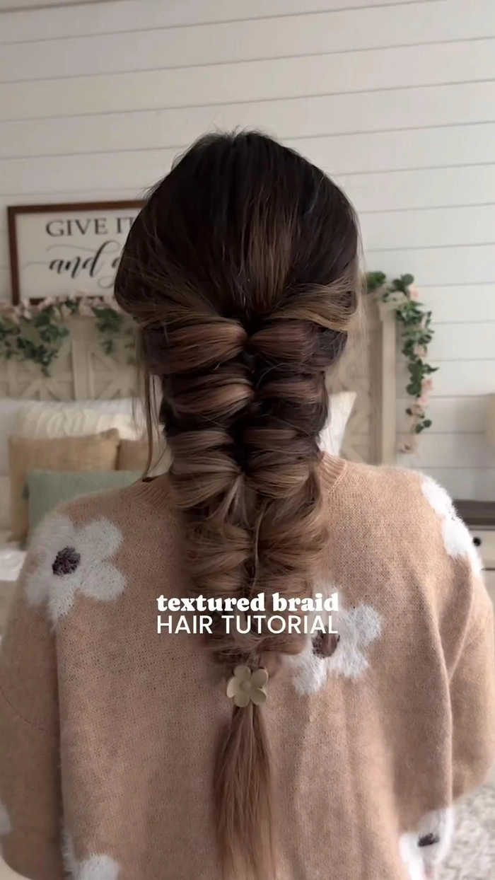 Casual hairstyle featuring a loose French braid perfect for countryside settings Effortless loose French braid styled for a relaxed country casual look