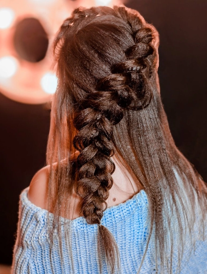 Casual Hairstyles featuring a loose French braid perfect for country style inspiration Effortless loose French braid styled for a relaxed country casual look