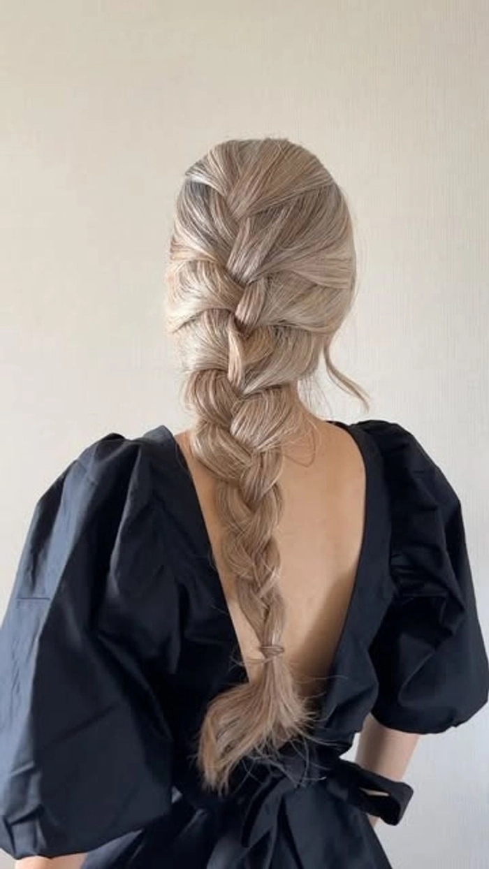 Casual country style featuring a soft, loose French braid for effortless elegance Effortless loose French braid hairstyle perfect for a relaxed country casual look