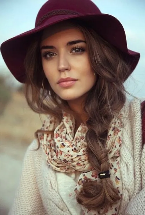 Effortless loose side braid hairstyle perfect for a casual autumn walk