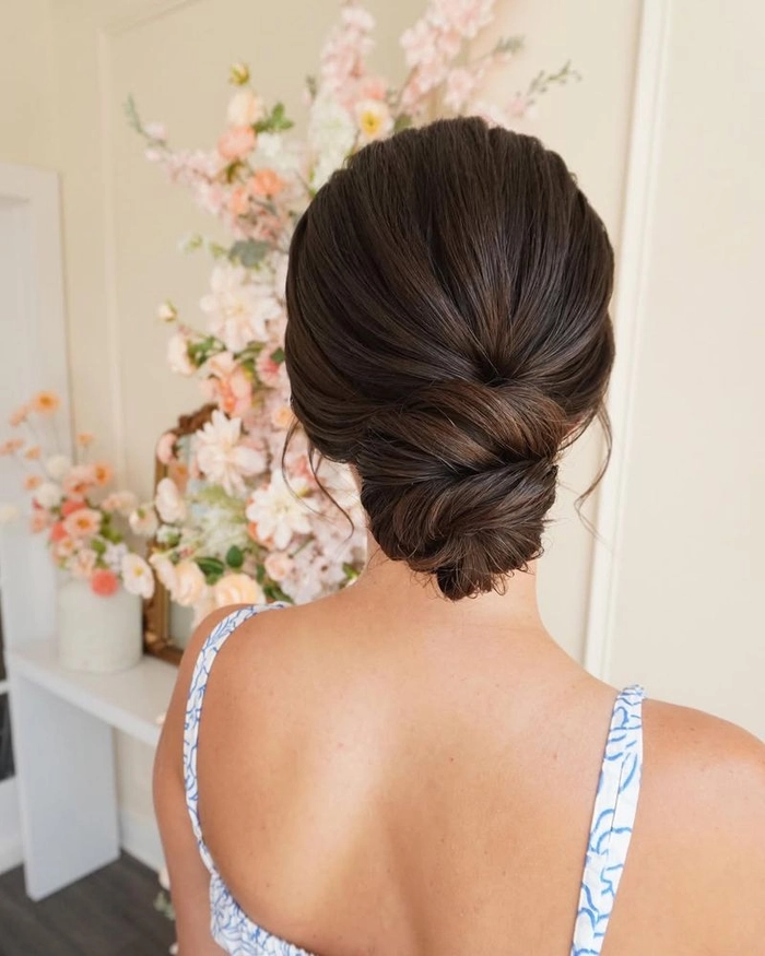 Effortless low chignon hairstyle perfect for casual evening dinners