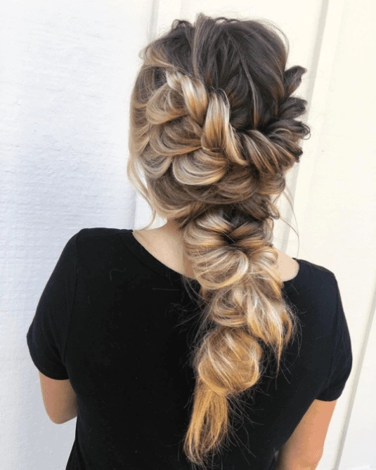Effortless loose side braid hairstyle perfect for casual autumn walks