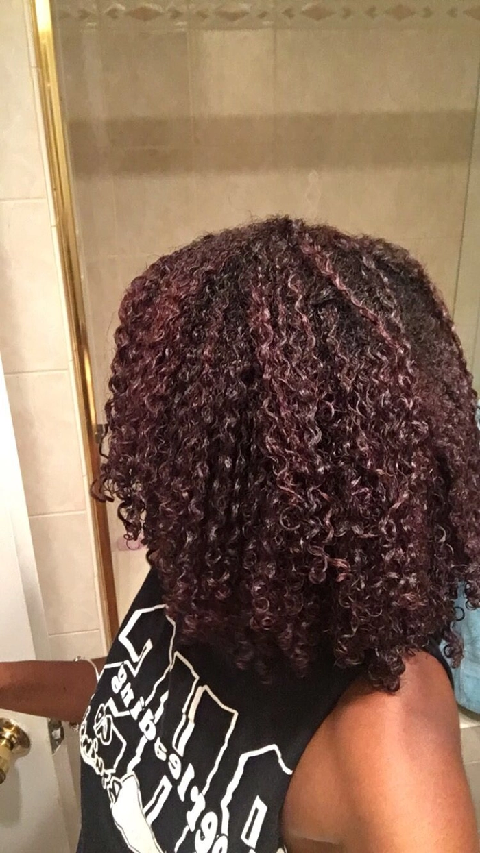 Showcasing an effortless wash and go style with defined type 3 curls for a polished casual look