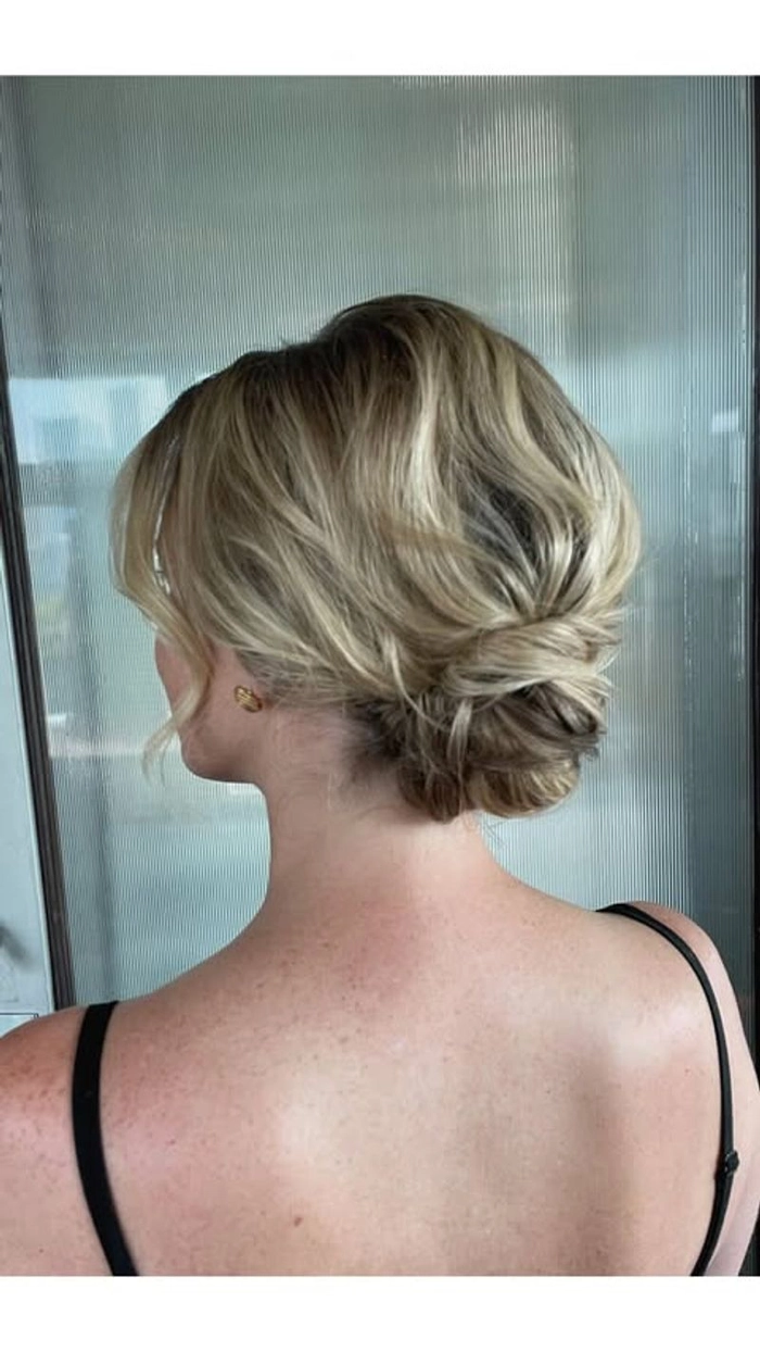 Elegant effortless low chignon hairstyle perfect for casual evening dinners