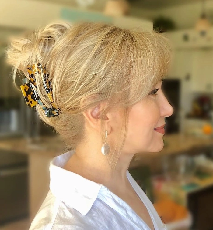 Elegant simple twisted updo hairstyle perfect for casual Friday office wear