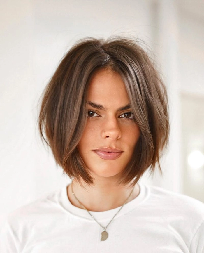 Casual blunt cut bob styling perfect for straight hair daily look Everyday blunt cut bob hairstyle for straight hair in casual setting