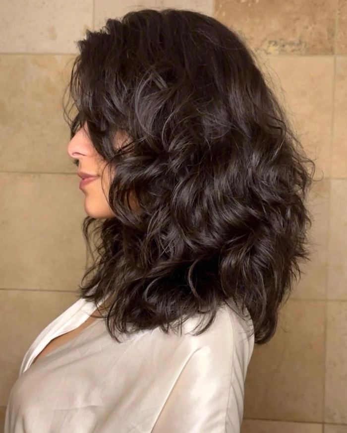 Everyday layered hair styling showcasing natural volume and effortless casual look