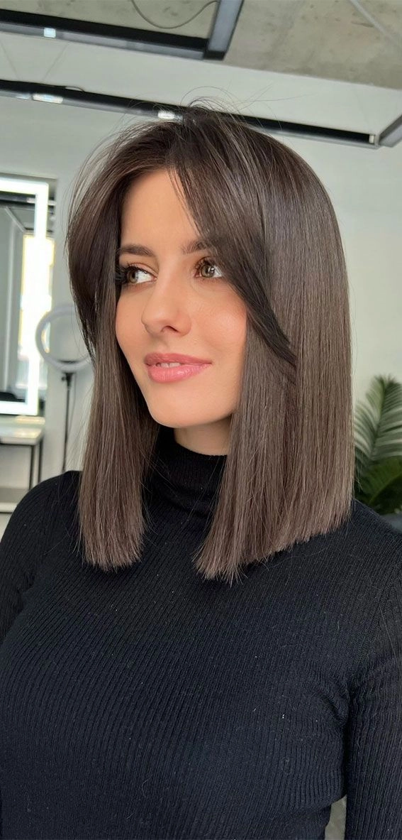 Everyday lob hairstyle with curtain bangs styled for a casual look