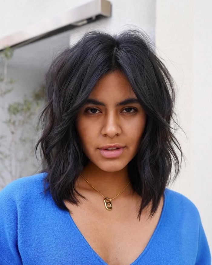 Everyday lob hairstyle with soft curtain bangs styled casually