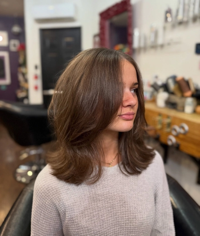 Everyday lob hairstyle with soft curtain bangs styled casually