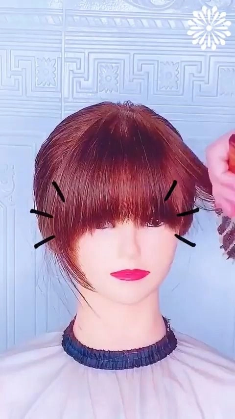 Easy clip in bangs hairstyle for an everyday casual look Woman with simple clip in bangs styling for a casual makeover