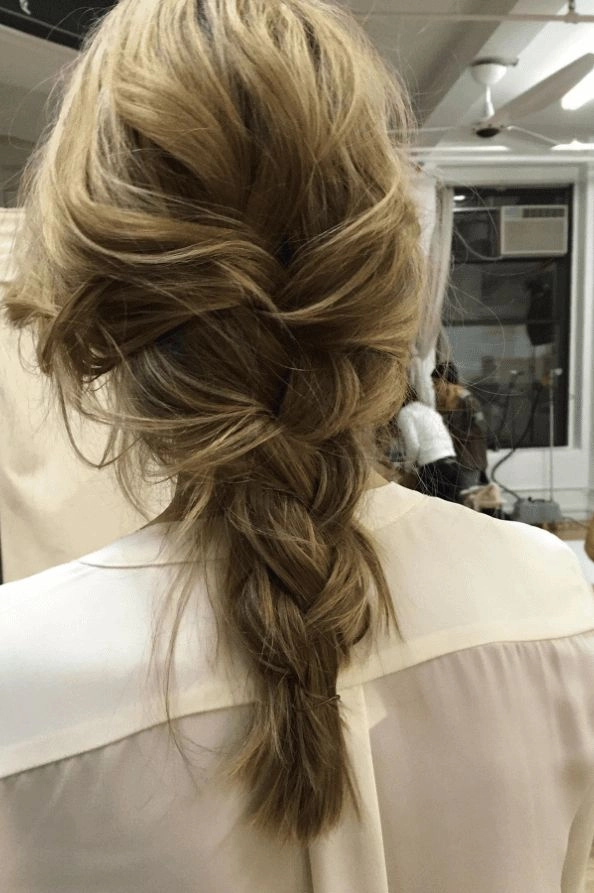 Effortless loose side braid hairstyle for casual autumn walks