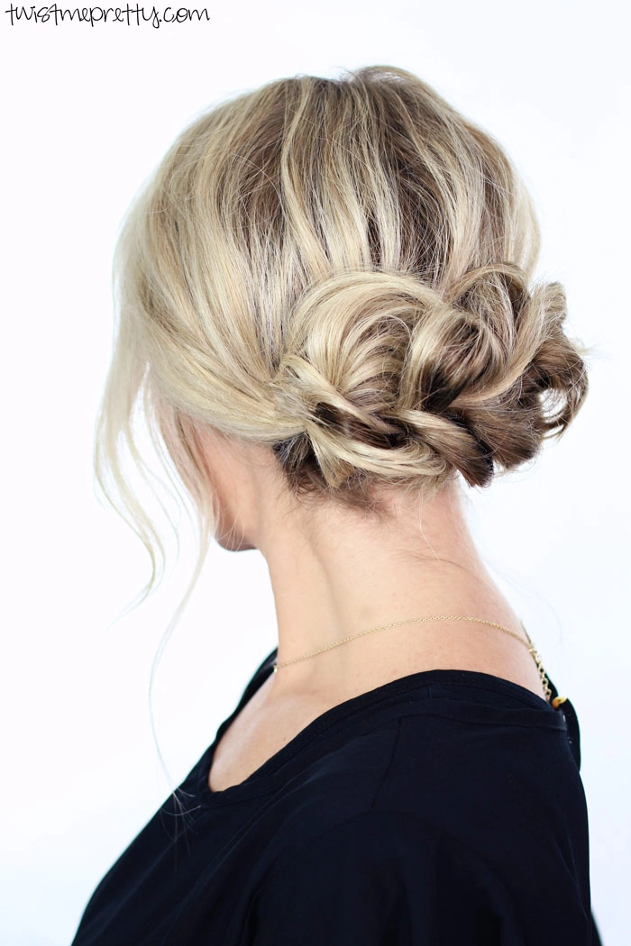 Casual holiday updo adorned with pearl hair pins Woman with simple pearl hair pin updo for casual holiday gathering