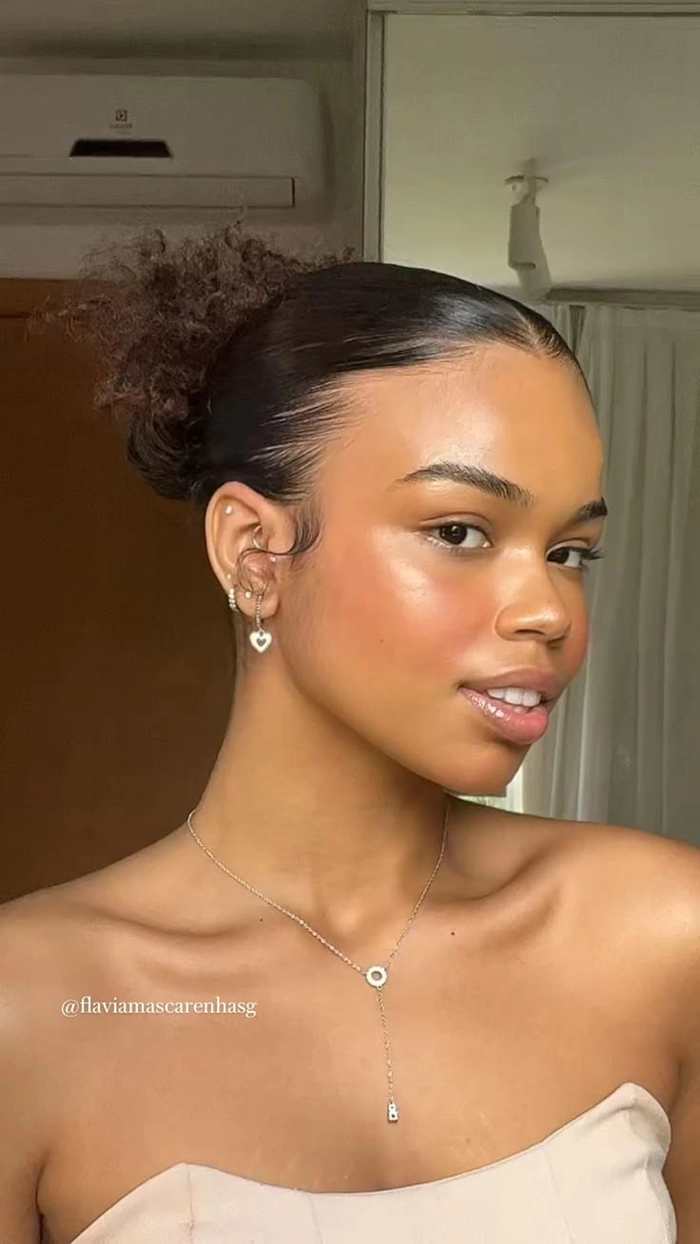 Quick casual low bun with slicked back style for a clean girl aesthetic