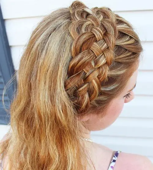 Long straight hair styled with a casual braided headband in a natural look
