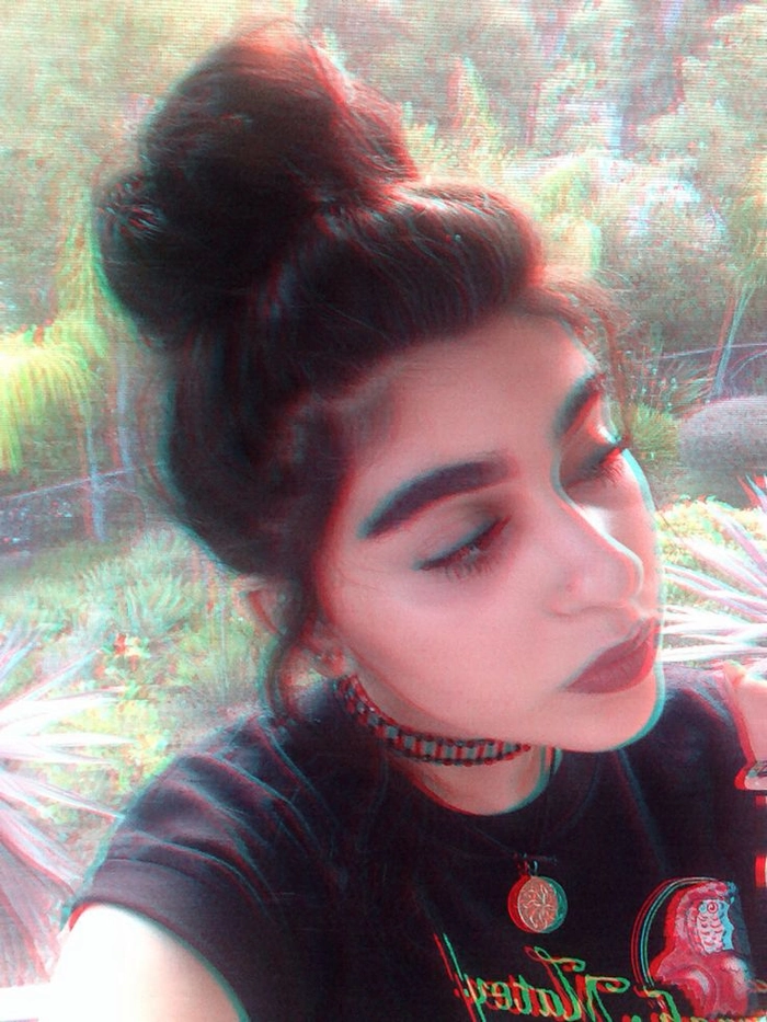 Effortless messy space buns perfect for a grunge casual hairstyle look