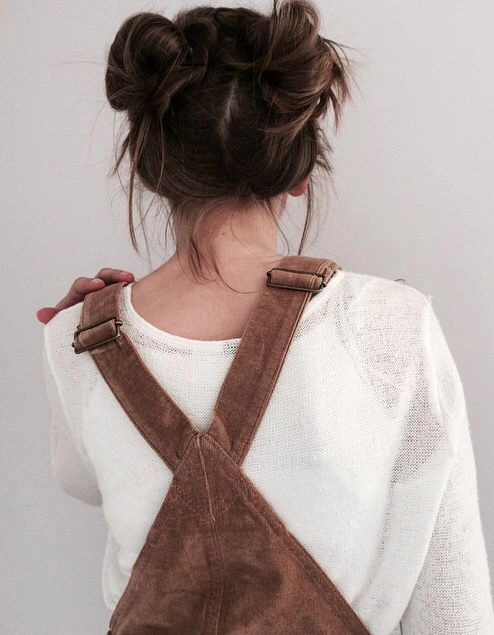 Effortless messy space buns hairstyle perfect for grunge casual aesthetics