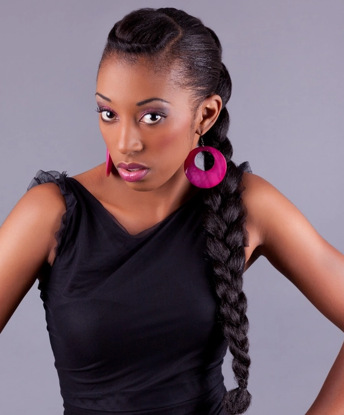 Casual and stylish relaxed braid out hairstyles for natural coils on natural hair Close-up of a natural hairstyle featuring relaxed braid out hairstyles for natural coils