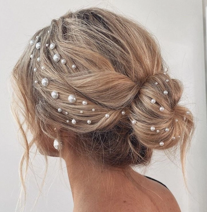 Simple pearl pin hairstyle for festive gatherings Pearl hair pin updo for casual holiday party