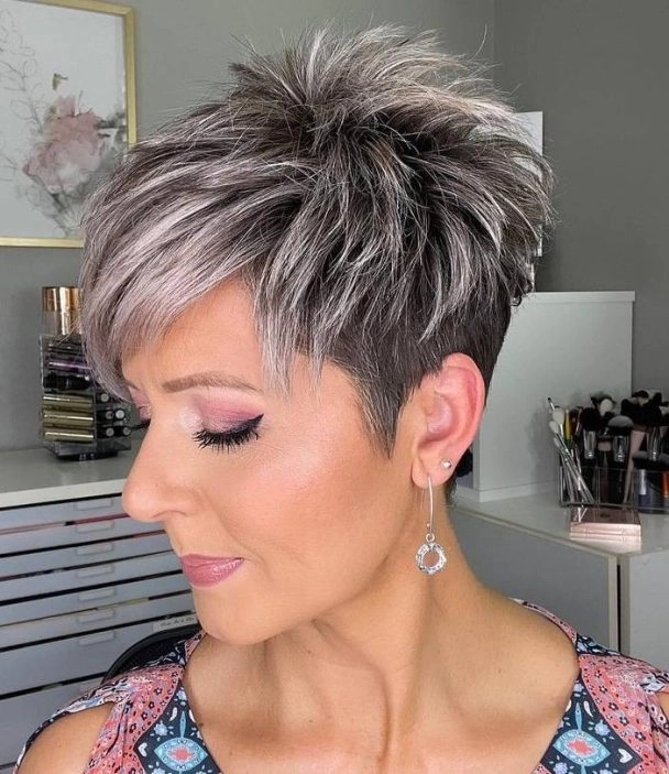 Casual hairstyles featuring a stylish pixie cut for mature women in a relaxed setting Everyday pixie cut styling for older women with soft waves and natural texture
