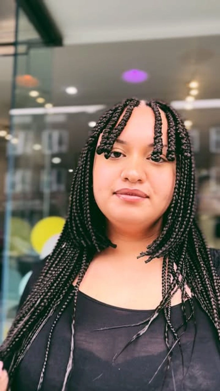 Casual hairstyle featuring easy braided bangs for a fresh look Quick braided bangs styled to keep hair neatly out of the face