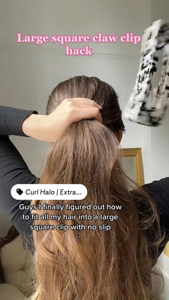 Woman wearing a quick claw clip hairstyle perfect for thick hair in a casual setting