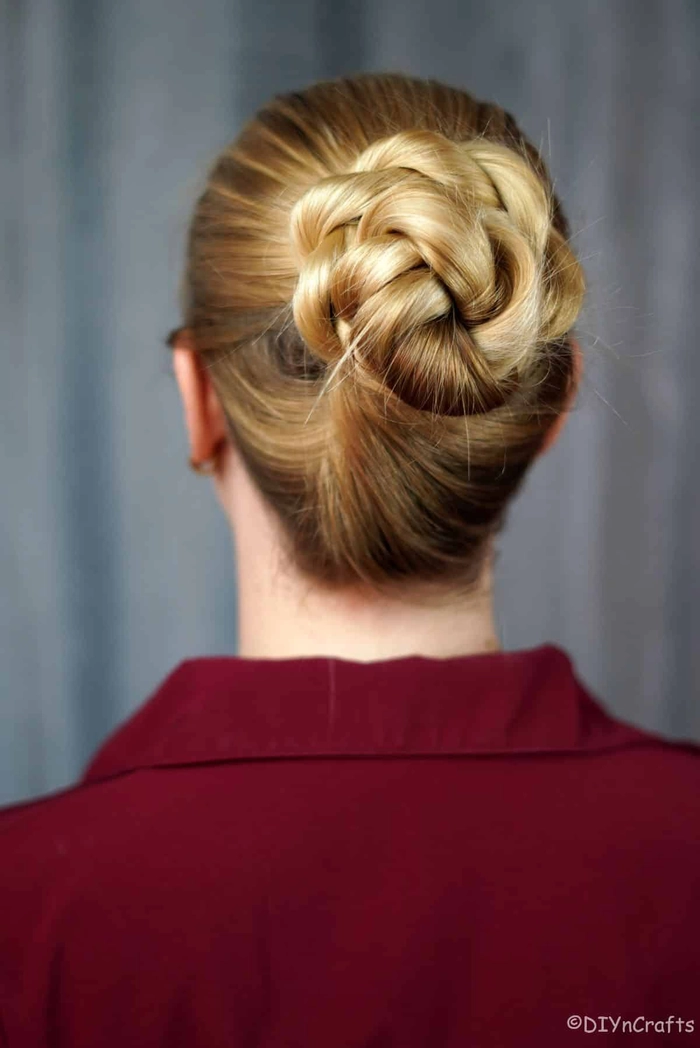 Casual Hairstyles Image 4 featuring an elegant low twisted bun for work and everyday wear Quick low twisted bun hairstyle suitable for professional casual settings