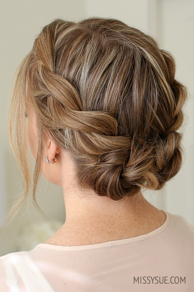 Casual hairstyle featuring a sleek low twisted bun for a polished look Quick low twisted bun hairstyle perfect for professional casual settings