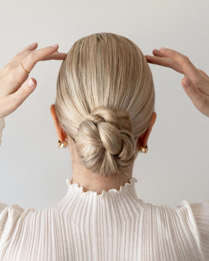 Elegant and easy low twisted bun for a polished casual look Quick low twisted bun hairstyle perfect for professional casual settings