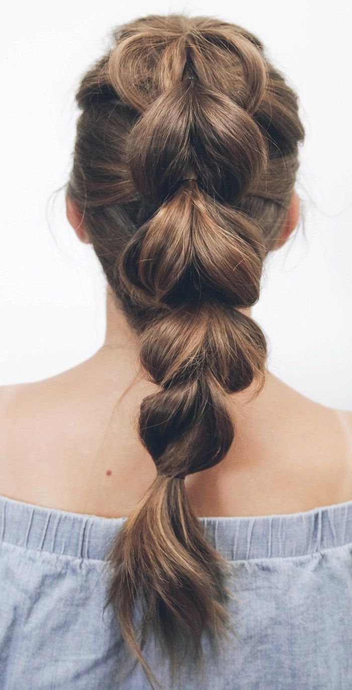 Casual hairstyle featuring a thick hair quick pull through braid style Quick pull through braid hairstyle on thick hair for a casual look