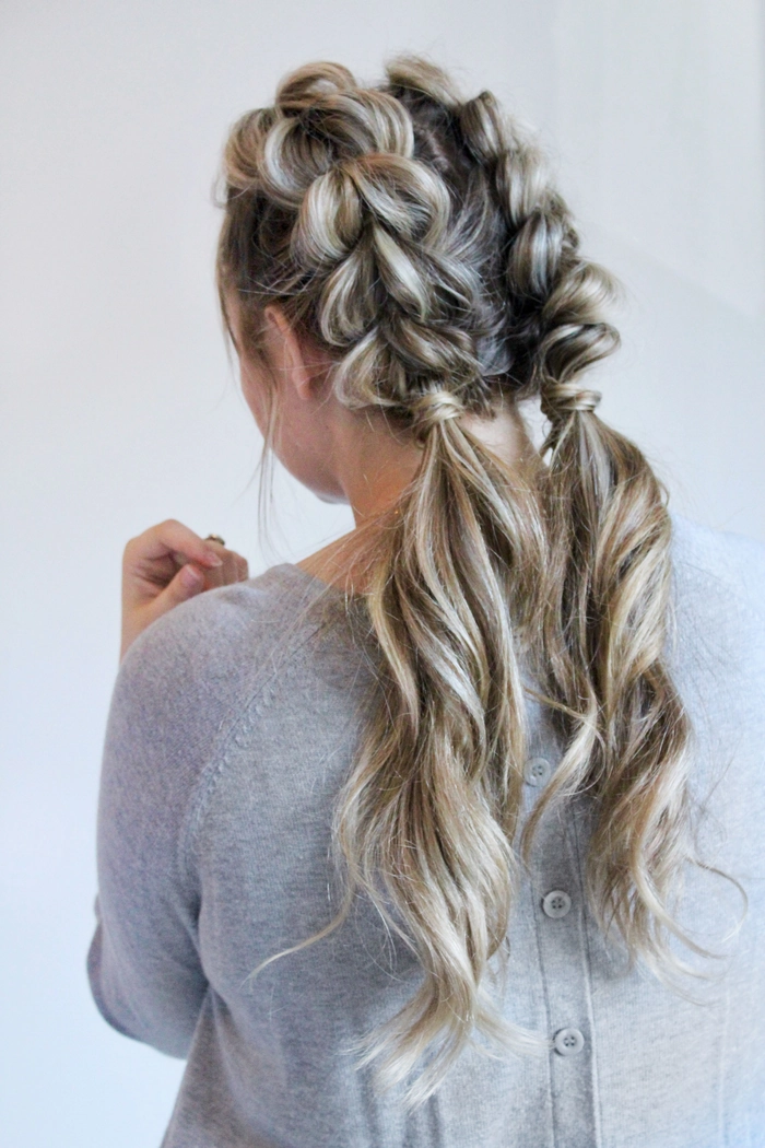 Casual hairstyle featuring a quick pull through braid for thick hair Quick pull through braid hairstyle on thick hair for a casual look