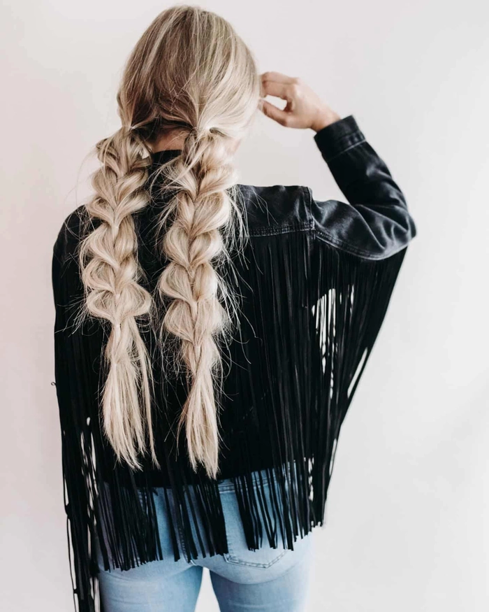 Casual thick hair styled in a quick and elegant pull through braid Quick pull through braid hairstyle on thick hair for a casual look