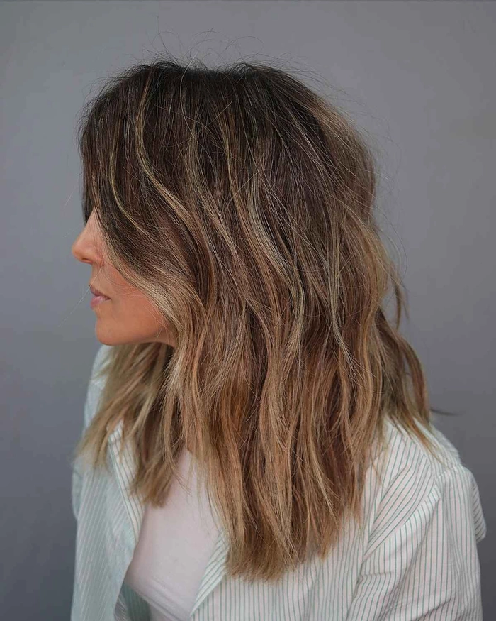 Casual and effortless beach waves for fine hair style inspiration Relaxed beach wave hairstyle on fine hair with soft natural curls