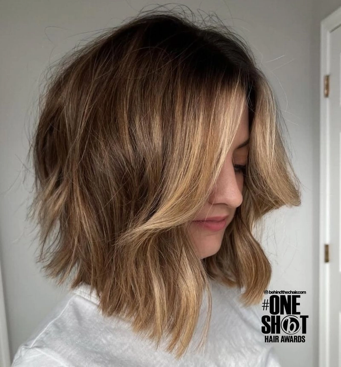 Relaxed bouncy blowout hairstyle for medium-length casual weekend hair