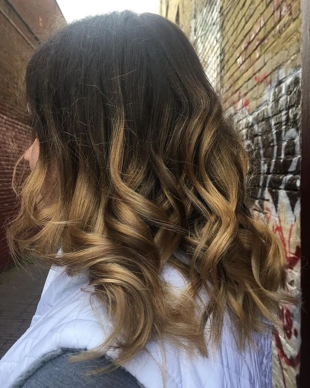 Casual hairstyle featuring relaxed loose curls for medium length hair, image 13 Relaxed loose curls styled on medium length hair for a casual look