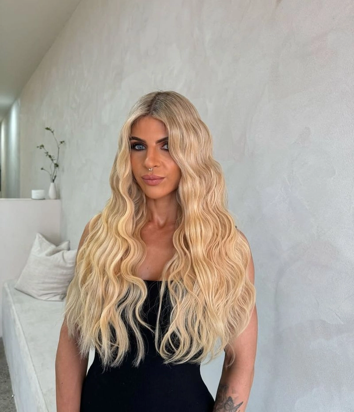 Relaxed mermaid waves hairstyle perfect for long casual beach days