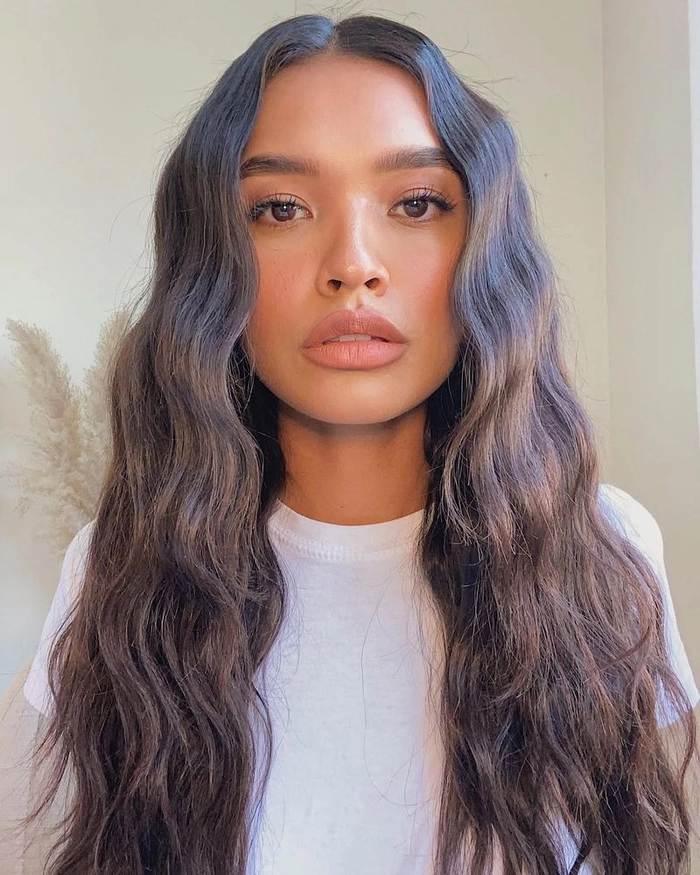Relaxed mermaid waves hairstyle perfect for long casual beach days