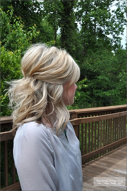 Relaxed pinned up hairstyle on medium curly hair for a casual look