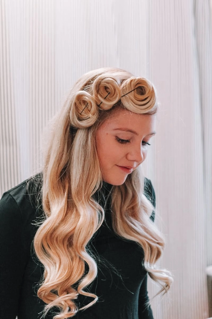 Relaxed pinned up hairstyle showcasing medium curly hair with soft waves
