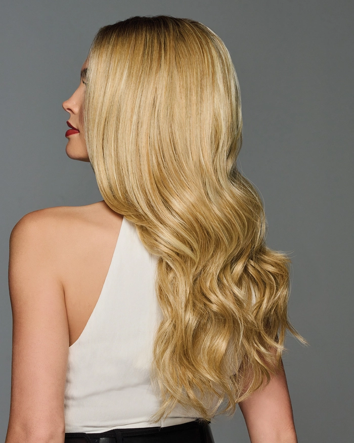 Relaxed tousled waves on long highlighted hair in a casual hairstyle