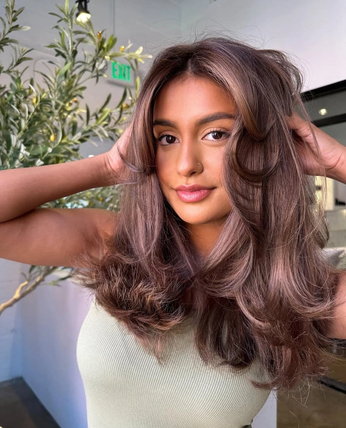 relaxed voluminous blowout for long casual weekend brunch -