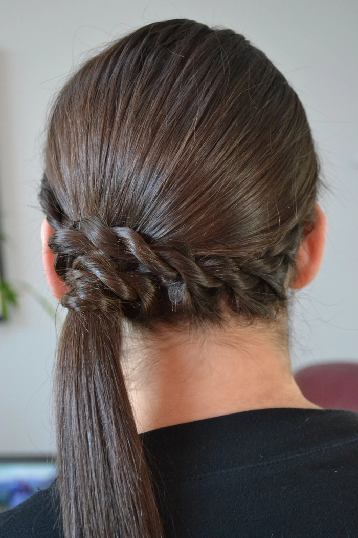 Simple rope braid ponytail styled for sporty casual days with a relaxed look