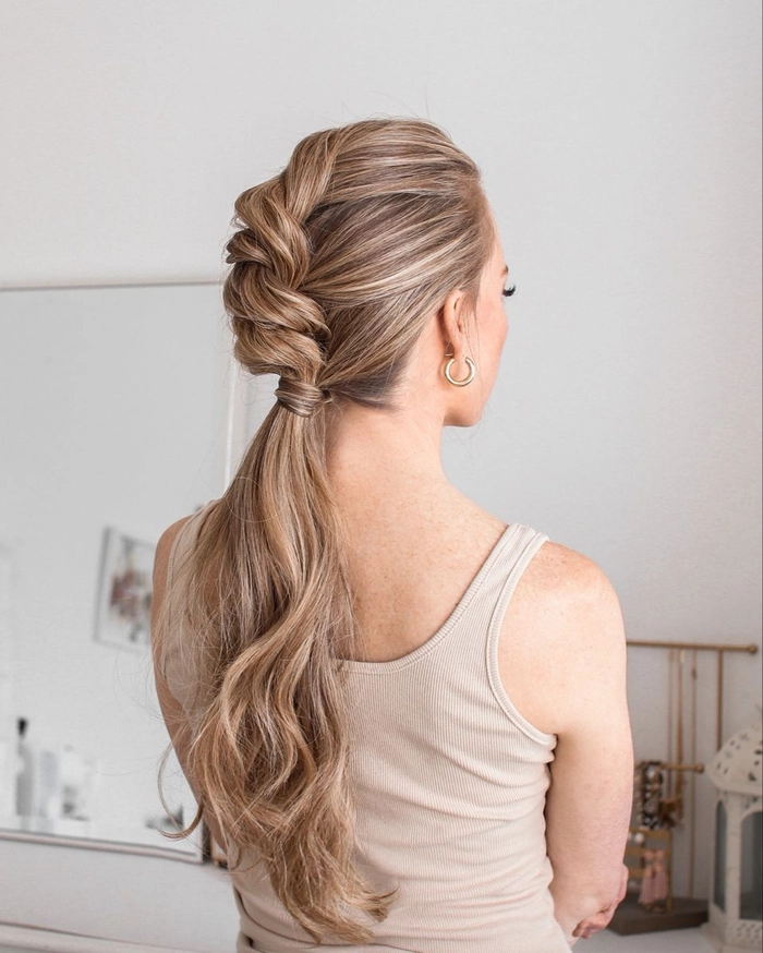 Simple rope braid ponytail hairstyle perfect for sporty casual days
